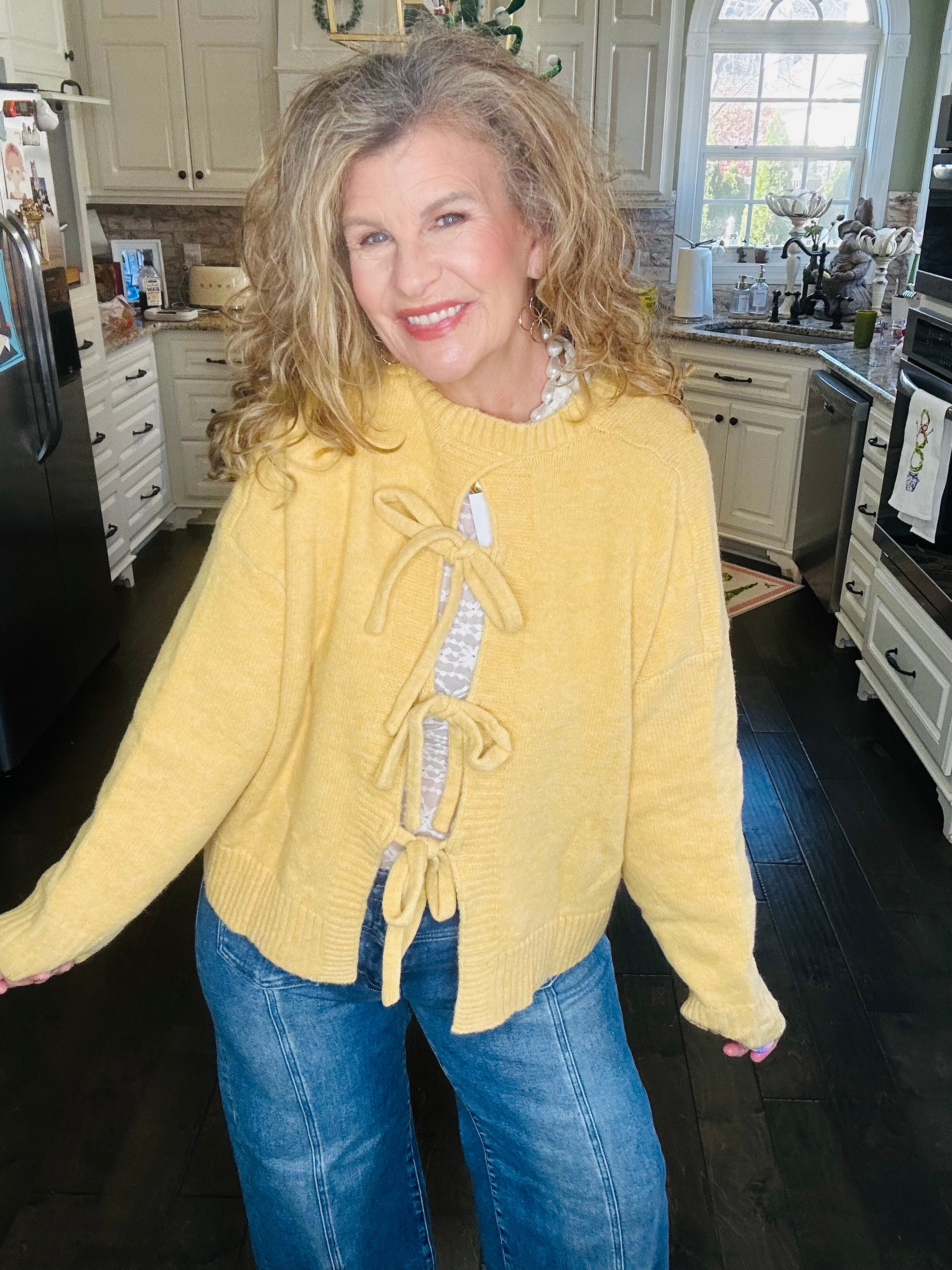 TIED AND TRUE BOW BACK SWEATER