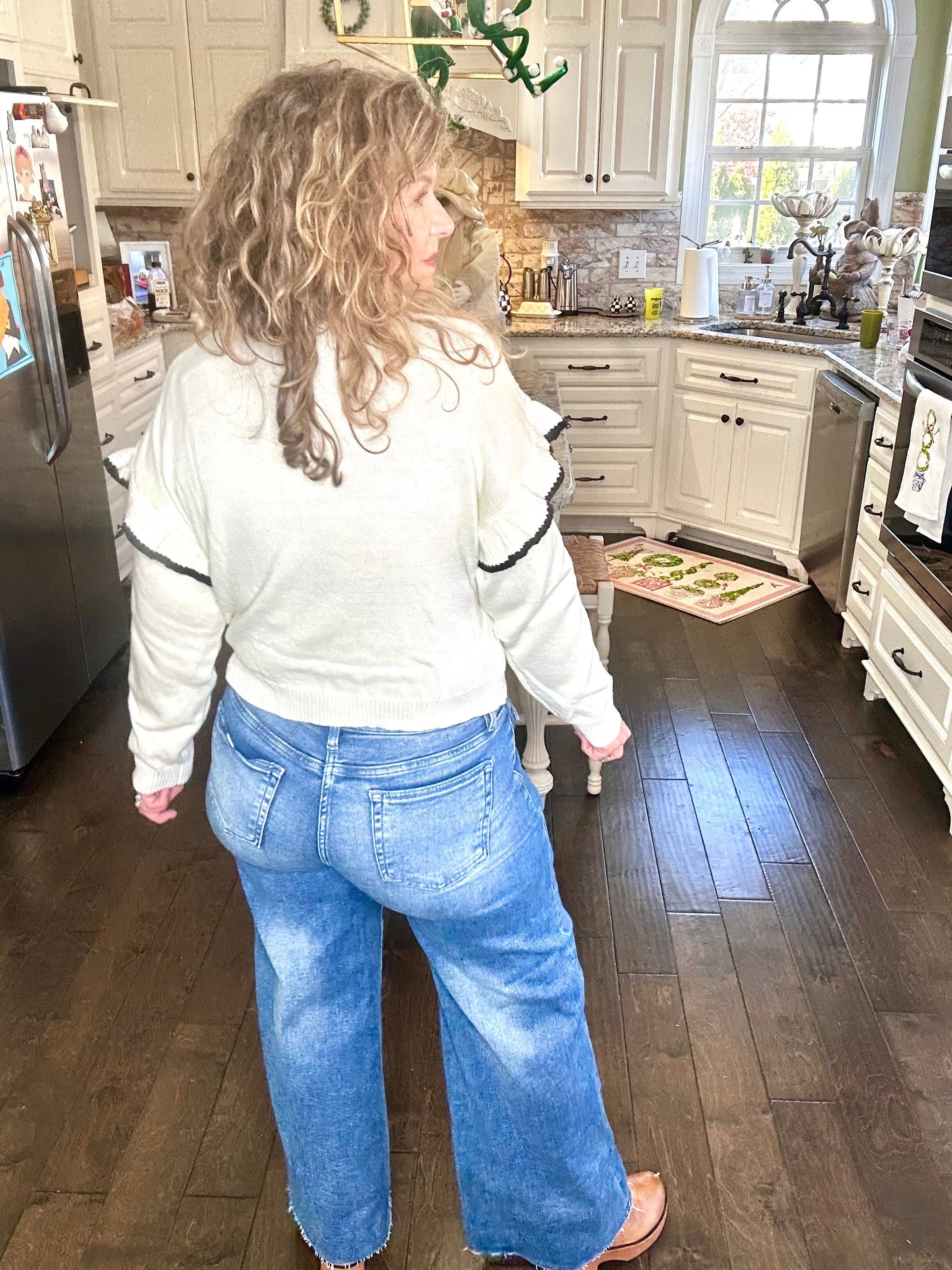 RUFFLED SHOULDER KNIT SWEATER