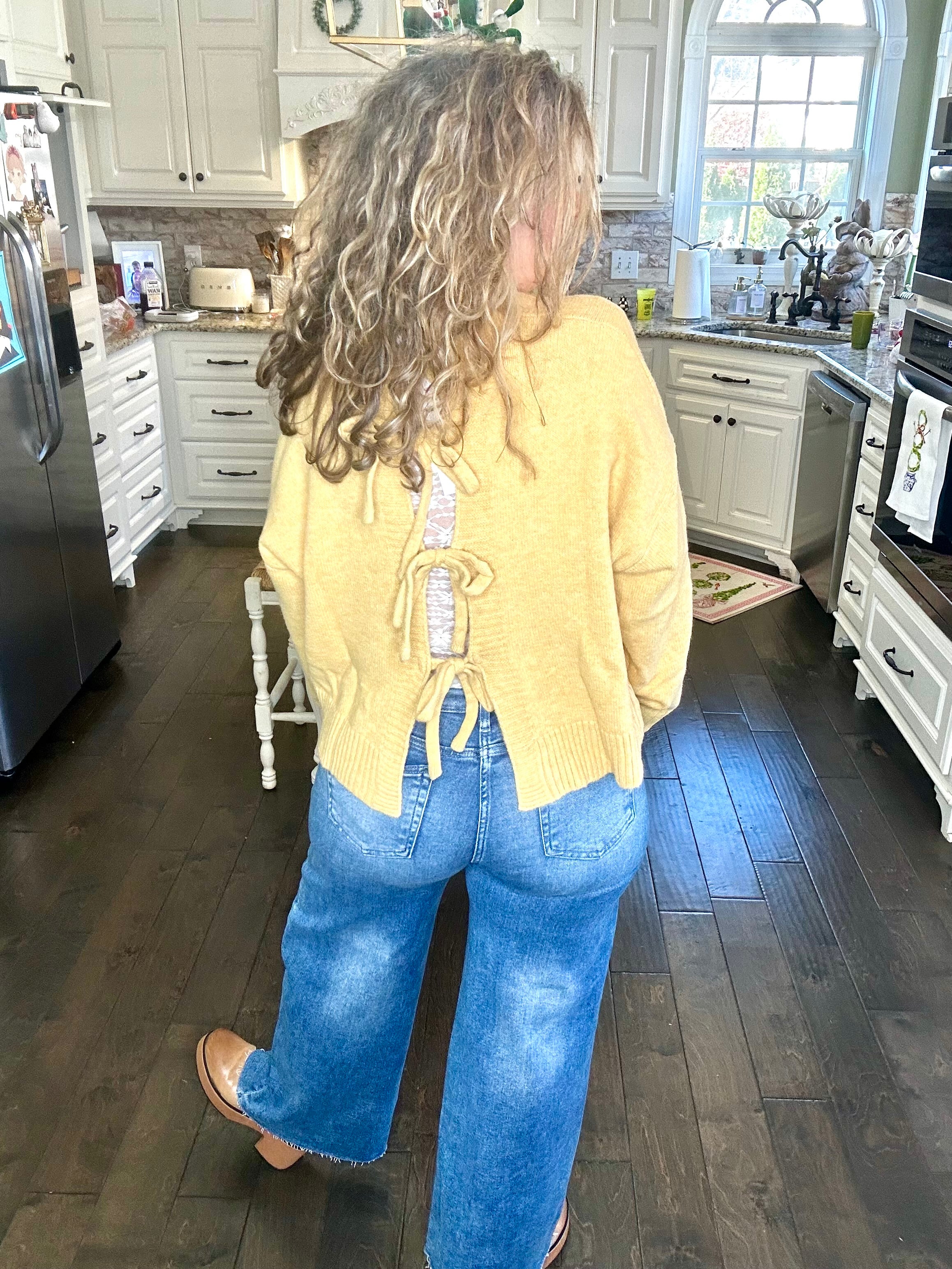 TIED AND TRUE BOW BACK SWEATER